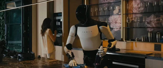 Робот-домработник: Tesla Optimus научился гладить, убирать и готовить