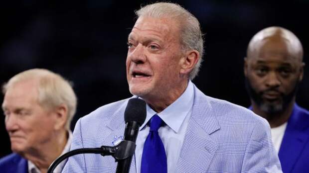 colts owner jim irsay in a blue suit giving a speech