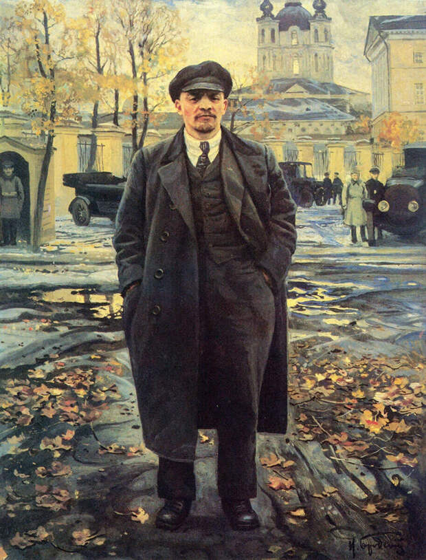 Ленин в Петрограде. Кепка-восьмиклинка, костюм-тройка, двубортное пальто. Кстати, именно в этом пальто Ленин был 30 августа 1918 года, когда в него стреляли на заводе им. Михельсона. Исаак Бродский. «В. И. Ленин на фоне Смольного» (1925)