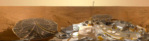 a photo of the surface of Mars taken by NASA’s Phoenix Mars lander from its landing site