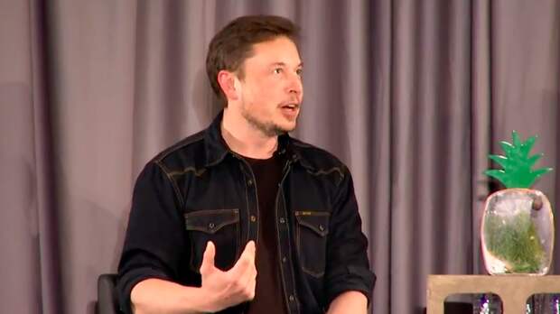 Musk, supes casual, describing his invention.