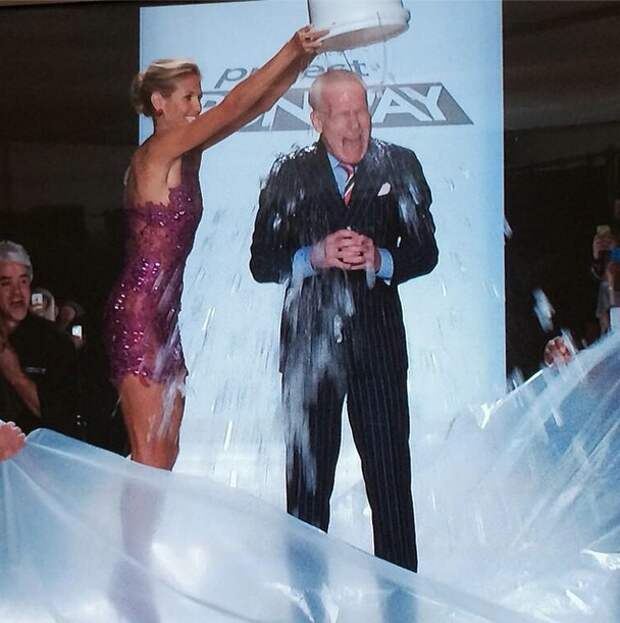 Tim Gunn was drenched with water by co-host Heidi Klum 