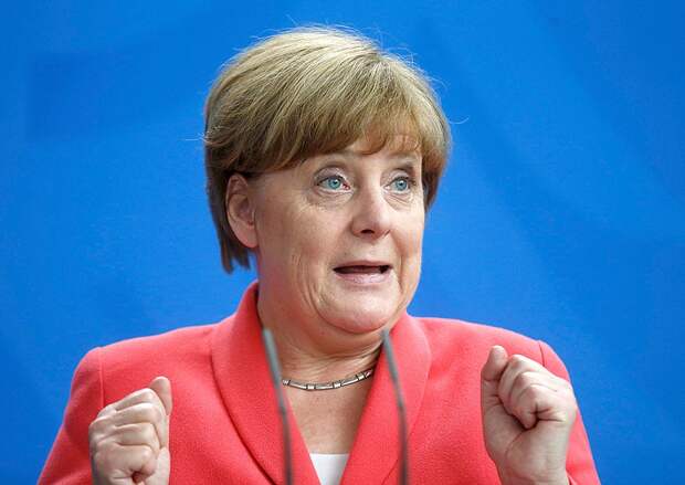 Меркель сделала больше всех для привлечения волны мигрантов с разоренного Ближнего Востока в Европу Фото: REUTERS