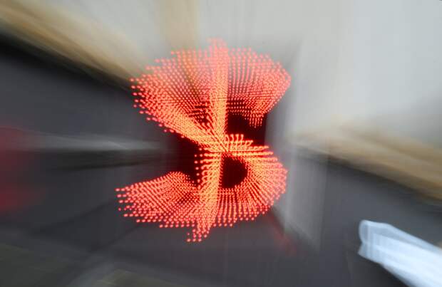 Банк России понизил курс доллара