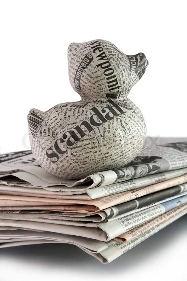 https://www.colourbox.dk/preview/2916562-newspaper-duck-on-a-stack-of-newspaper.jpg