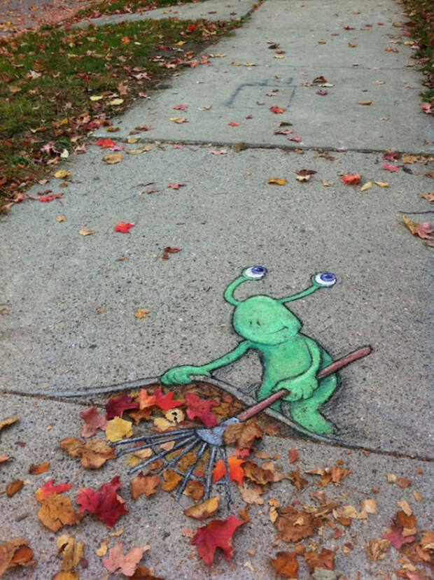 funny-street-art-monster-cleaning-leaves