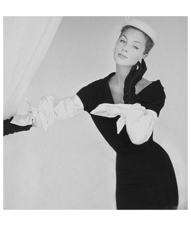 Suzy Parker,wearing black dress and white hat by Hattie Carnegie, with white bowknot satin sleeves by Balenciaga Vogue, September 15, 1953 Photo John Rawlings Suzy Parker,wearing black dress and white hat by Hattie Carnegie, with white bowknot satin sleeves by Balenciaga Vogue, September 15, 1953 Photo John Rawlings