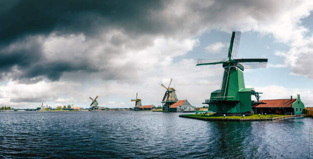 Panoramic view of Authentic Zaandam mills in Zaanstad village on the river Zaan.