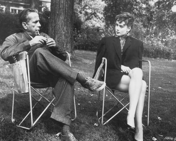 Humphrey Bogart and Audrey Hepburn on the set of Sabrina in 1954