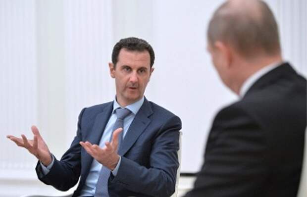 Президент Сирии Башар Асад и президент РФ Владимир Путин во время встречи в Кремле