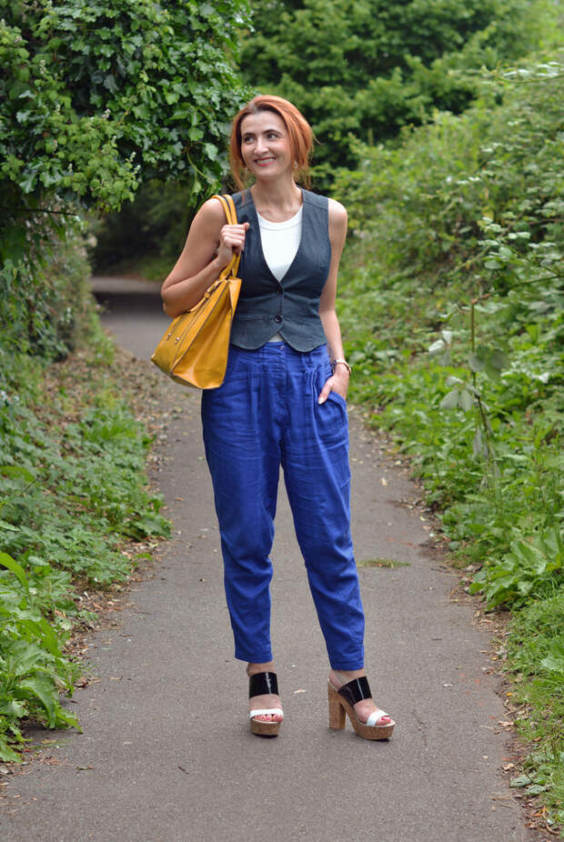 Not Dressed As Lamb: Vest/waistcoat with loose blue trousers, yellow tote