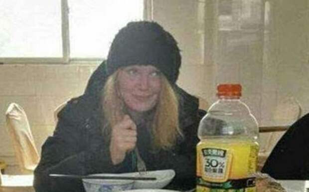 Russian hitchhiker, found starving and penniless while walking along a Chinese expressway