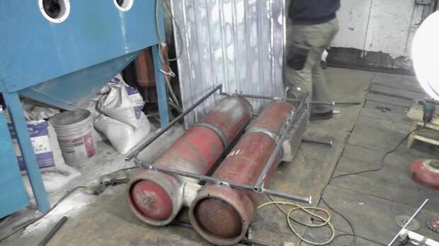 Отопительная батарея на дровах из газовых баллонов