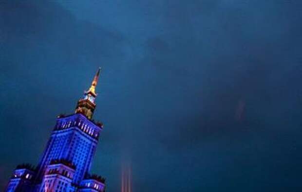 The Palace of Culture and Science (PKiN) is illuminated in the evening in central Warsaw August 8, 2011. Poland and Ukraine are preparing to co-host the Euro 2012. REUTERS/Kacper Pempel (POLAND - Tags: SPORT SOCCER CITYSCAPE IMAGES OF THE DAY)