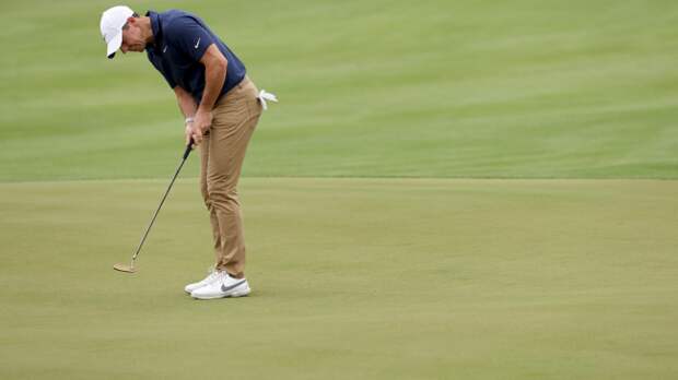 Rory McIlroy reacts after missing a putt.