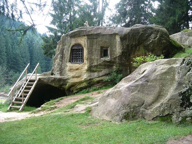 House carved into a stone by a 15th century Romanian monk