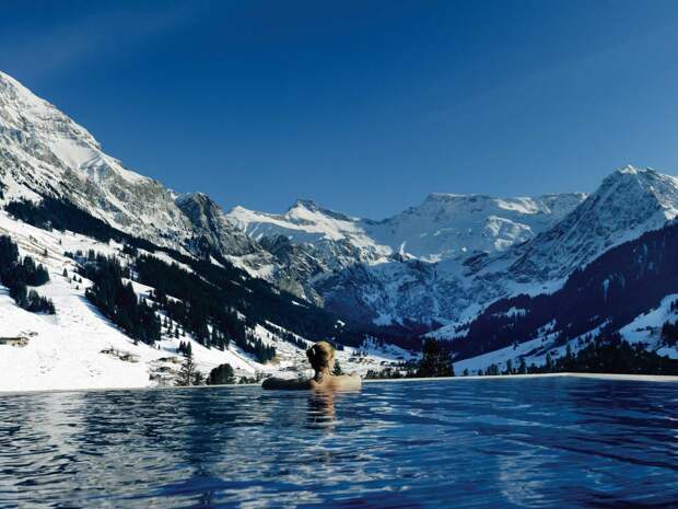 located-in-the-heart-of-the-swiss-alps-the-cambrian-hotel-offers-a-pool-with-awe-inspiring-views-of-the-alps