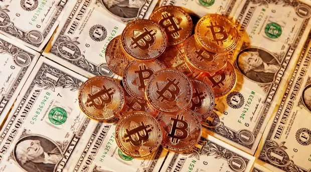 Цифровой ажиотаж: курс биткоина впервые превысил $63 тысячи