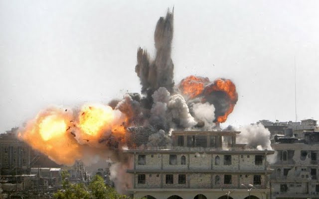 http://www.walltor.com/images/wallpaper/insurgent-building-take-a-direct-hit-from-missiles-attack-89011.jpg