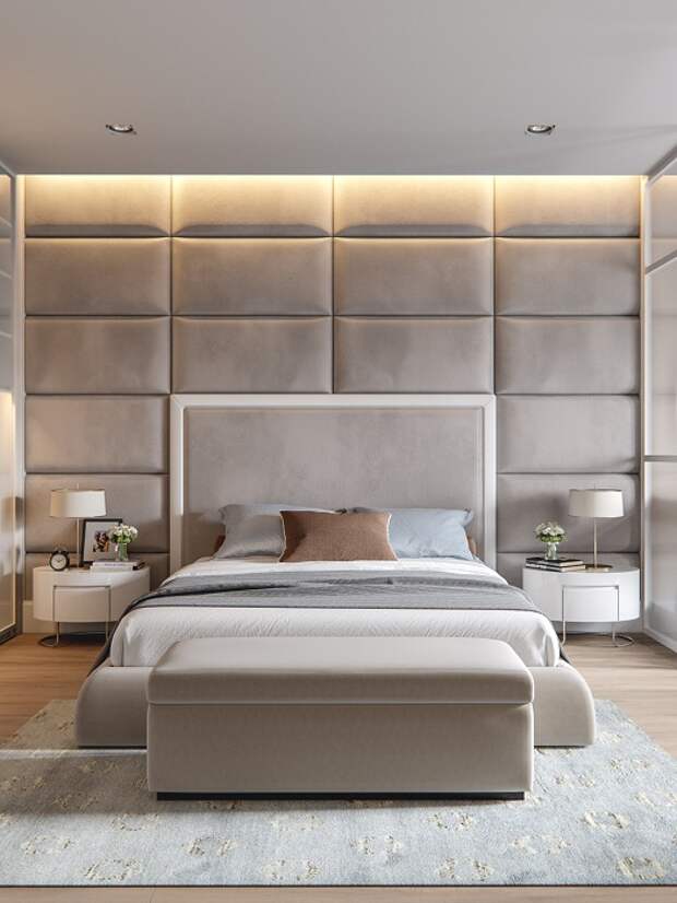 Серый интерьер спальной с крутой мягкой стеной, что точно понравится.