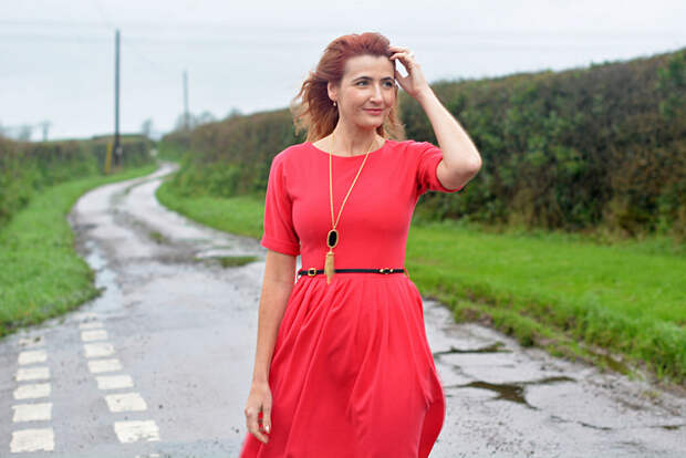 Red fit and flare dress, black and gold pendant