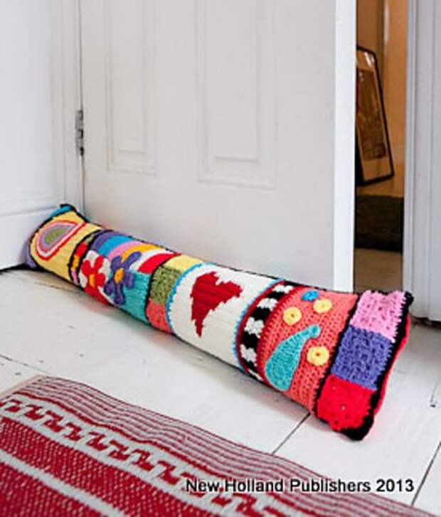 Crochet Graffiti Door Pillow (draft catcher) pattern published in Hip Crochet: 25 Gorgeous Projects for the Home by Natalie Clegg