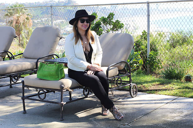 Rossana Vanoni lounging by the pool in Pacific Palisades fashionista blog