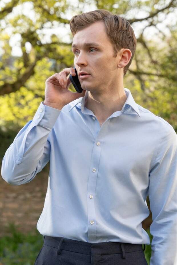 Robert takes a phone call during the season premiere of Industry.