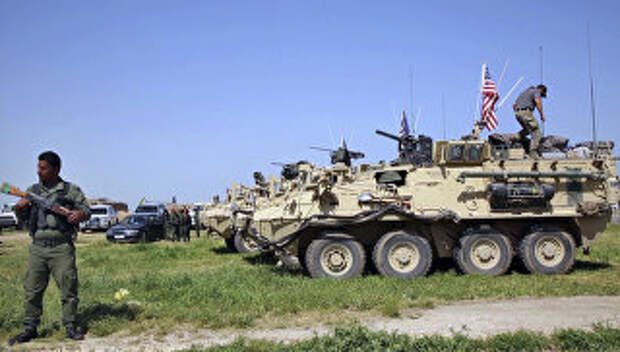 Военные США занимают позиции в деревне Дарбасия, Сирия. Архивное фото