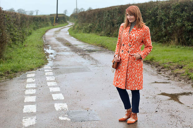 Orange animal print coat with navy | Not Dressed As Lamb