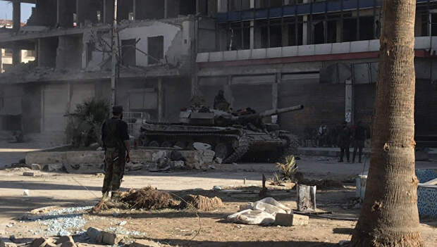 Бронетехника сирийской армии в освобожденном населенном пункте. Архивное фото