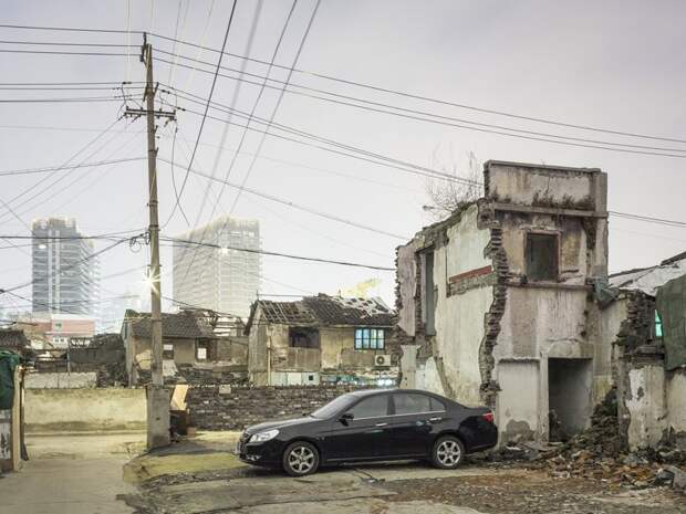 Трущобы упрямых китайцев, отказывающихся переселяться в квартиры (23 фото)