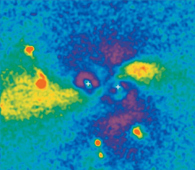 Изображение, полученное «вычитанием» из исходной фотографии излучения двух эллиптических галактик