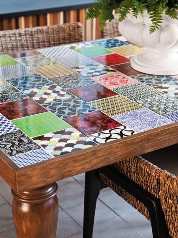 So Cool and Looks easy to clean.. I could definitely do this to an old table! Would be cool for an outdoor table.!