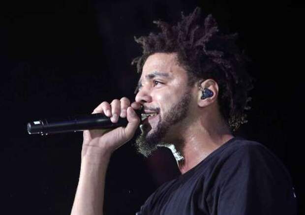 J. Cole performs at Aaron's Amphitheatre at Lakewood on Saturday, August 15, 2015, in Atlanta. (Photo by Robb D. Cohen/Invision/AP)