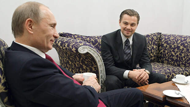 Владимир Путин и Леонардо Ди Каприо. Архивное фото Владимир Путин и Леонардо Ди Каприо. Архивное фото