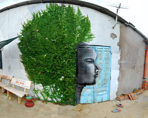 funny-street-art-woman-hair-bush-wall