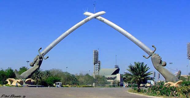 http://www.theodora.com/wfb/photos/iraq/monumental_gates_saber_stadium_baghdad_iraq_photo_iraq-ir.jpg