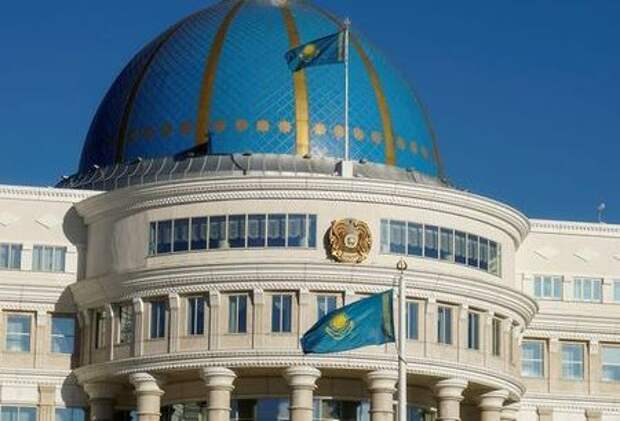National flags and emblem are seen on Akorda, the official residence of Kazakhstan's President, in Astana, Kazakhstan, September 4, 2016. REUTERS/Shamil Zhumatov