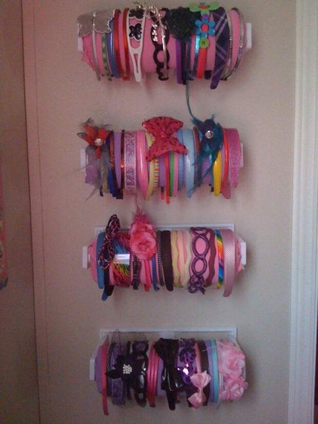 PERFECT! hung papertowel holders from the dollar store and then hotglued fabric on a roll of papertowels. I've seen fancier ones, but mine were super inexpensive! :0): 