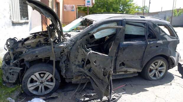 Автомобиль, развозивший гумпомощь, взорвался в центре Мелитополя - РИА Новости, 1920, 21.08.2022