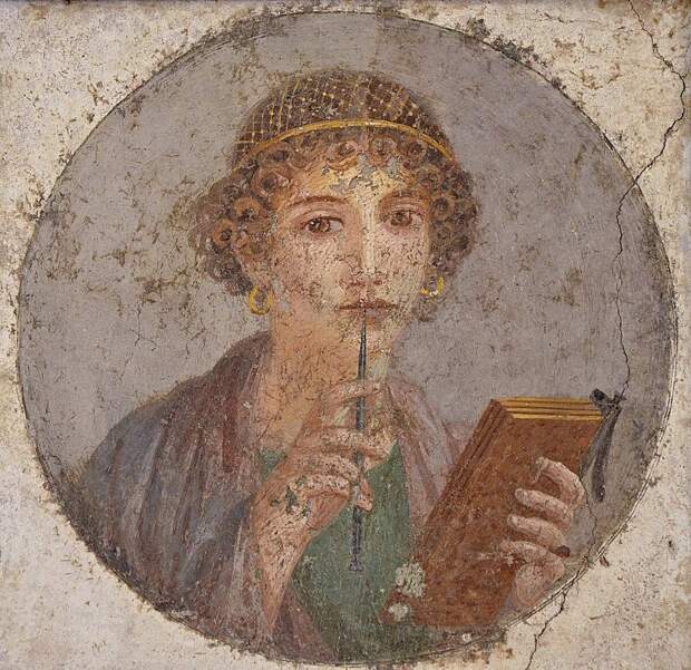 Помпейская фреска с изображением женщины, пишущей на восковой табличке, часто называемой Сафо, ок. 55–79 гг. н. э., Национальный археологический музей, Неаполь.