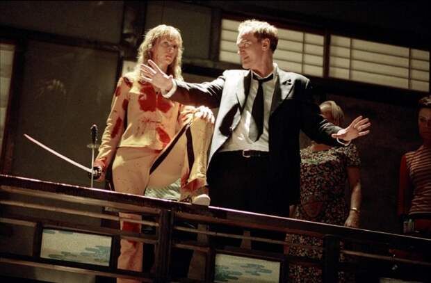 Ума Турман и Квентин Тарантино во время съёмок фильма «Убить Билла». Фото