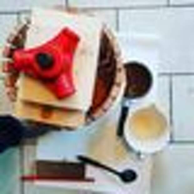 Scrumpy being made in a cider press.