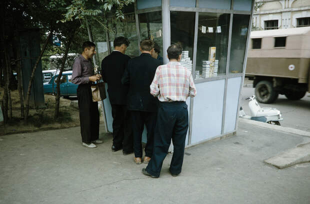 Russia, men purchasing from tobacco stand in Khabarovsk Russia, men purchasing from tobacco stand in Khabarovsk