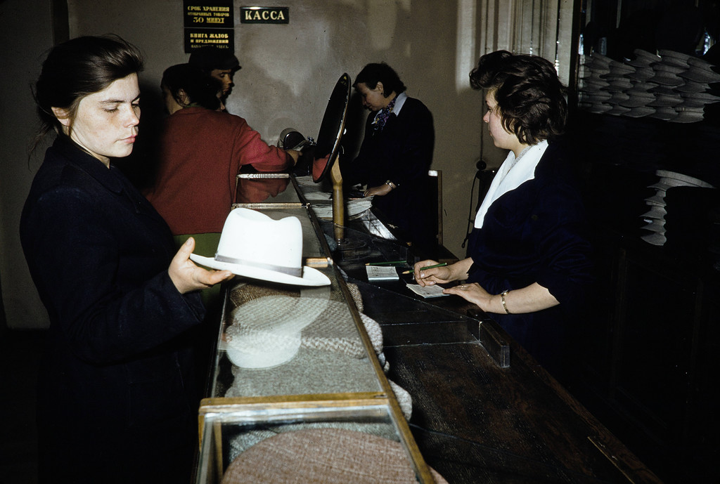 Russia, clerks assisting customers at store in Moscow Russia, clerks assisting customers at store in Moscow