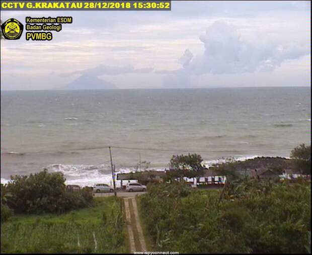Krakatoa seen yesterday from the coast - Anak Krakatau is no longer visible, only small ash and steam plumes rising from behind Sertung (image: VSI webcam)