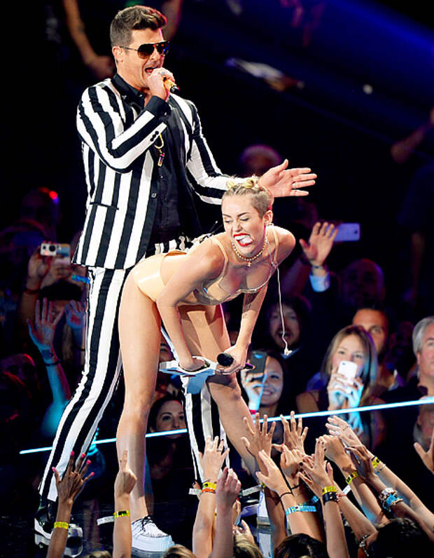 Robin Thicke and Miley Cyrus perform onstage during the 2013 MTV Video Music Awards at the Barclays Center on August 25, 2013 in the Brooklyn borough of New York City.