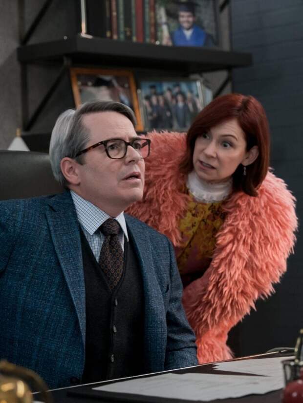 Matthew Broderick as Lawrence Grey and Carrie Preston as Elsbeth Tascioni