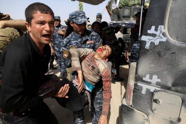 Душераздирающие фотографии, сделанные во время боёв за Мосул и Ракку